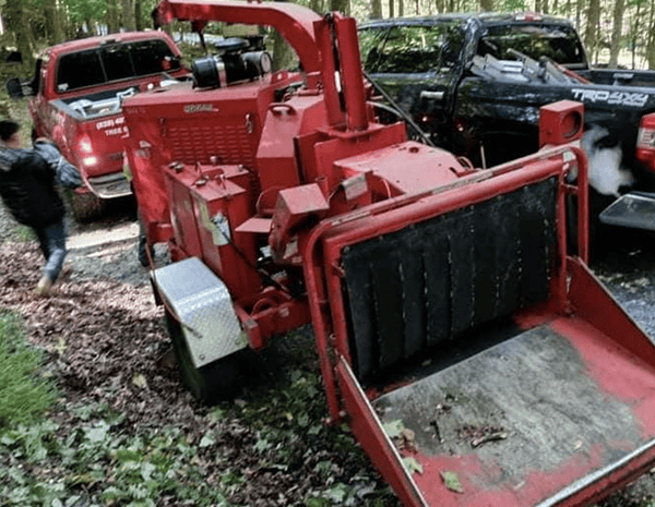 Brush chipping service in Asheville NC – professional crew turning branches and brush into mulch